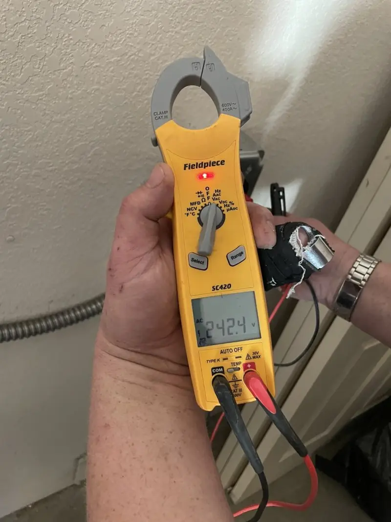 Voltage testing with clamp meter during Aluminum Wiring Replacement in Shelby